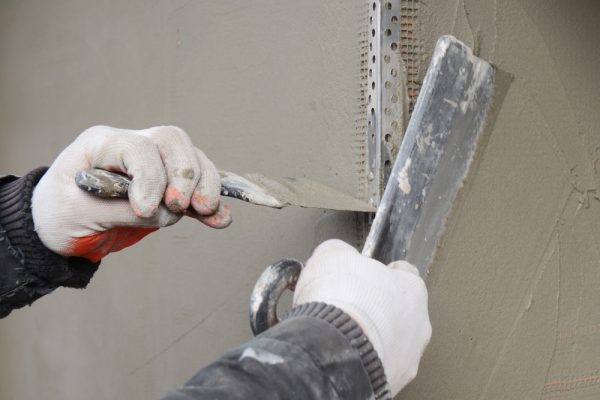 Close,Up,On,Applying,A,Coat,Of,Plaster,,Finish,Over